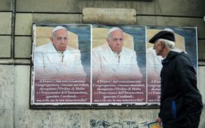 Posters criticizing pope Francis on a wall in Rome, Italy, 04 February 2017. Below the photograph of the pope is the following caption: 'You've put congregations under supervision, removed priests, decapitated the Maltese and Franciscan orders and ignored cardinals... But where is your compassion?' Francis' main message as pope has been compassion. His reformist policies are meeting resistance within the church. Photo: Lena Klimkeit/dpa